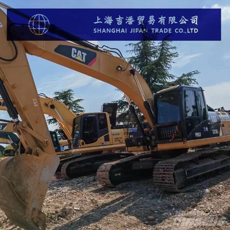 CAT 323 D Bageri guseničari