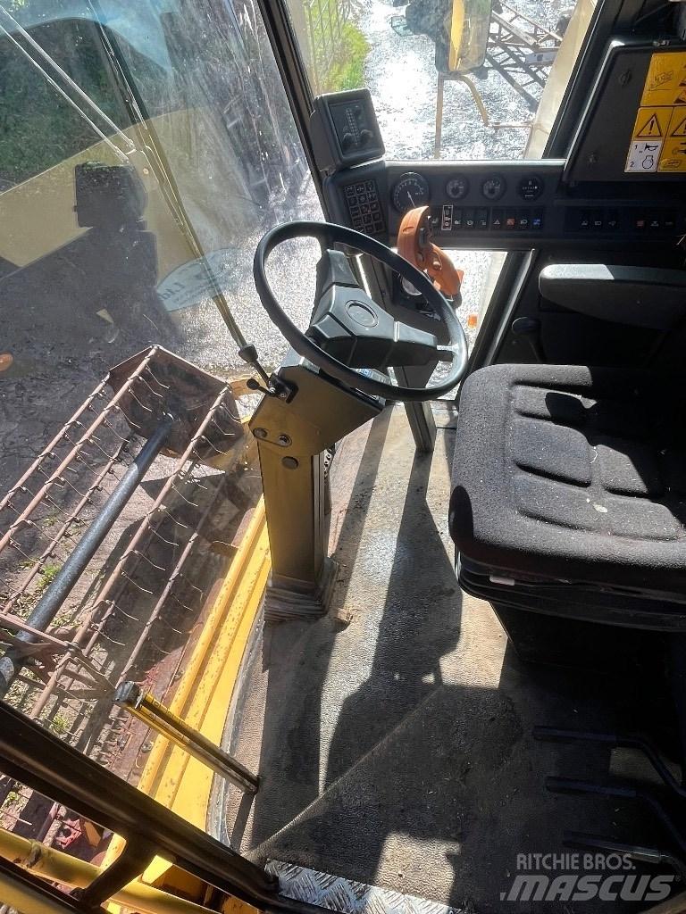 New Holland TC 56 H Kombajni