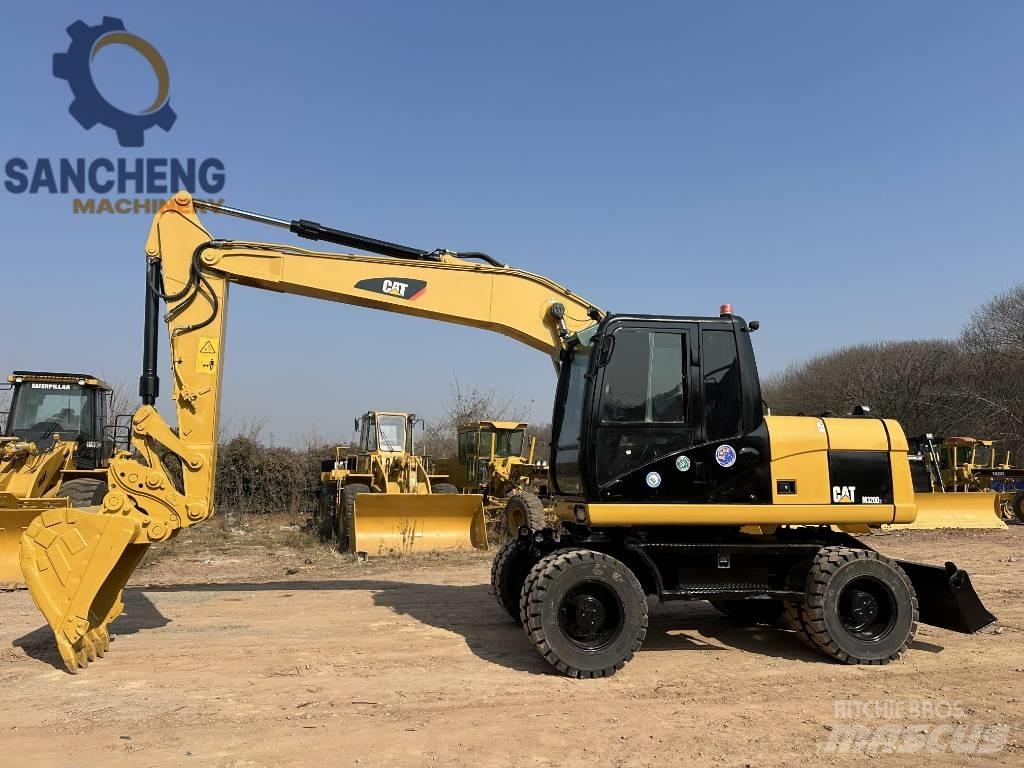 CAT M 320 D2 Bageri točkaši