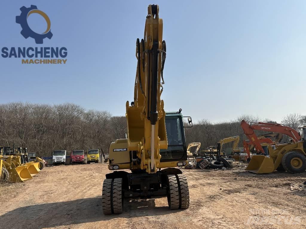 CAT M 320 D2 Bageri točkaši