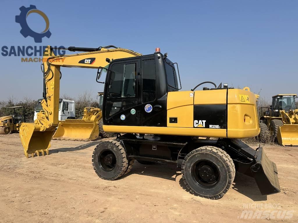 CAT M 320 D2 Bageri točkaši