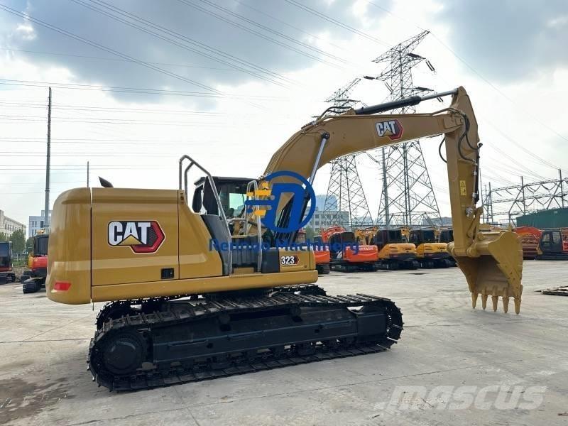 CAT 323 GC Bageri guseničari
