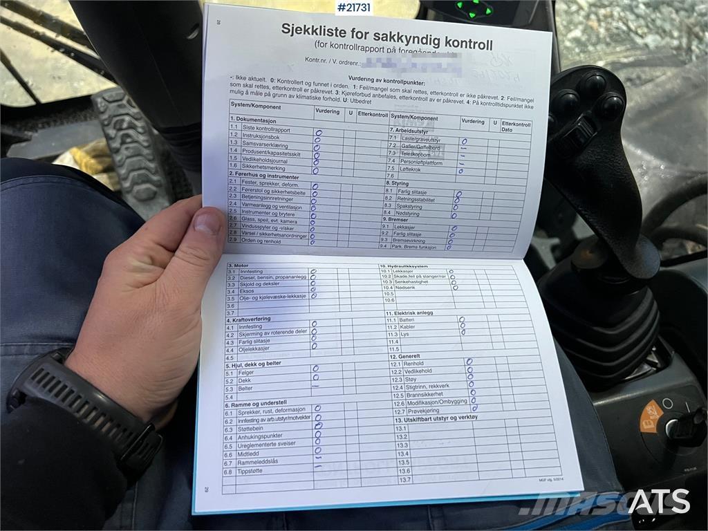 CAT M318F Bageri točkaši