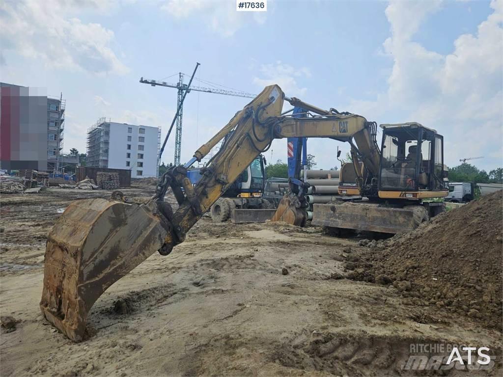 CAT M312 Bageri točkaši