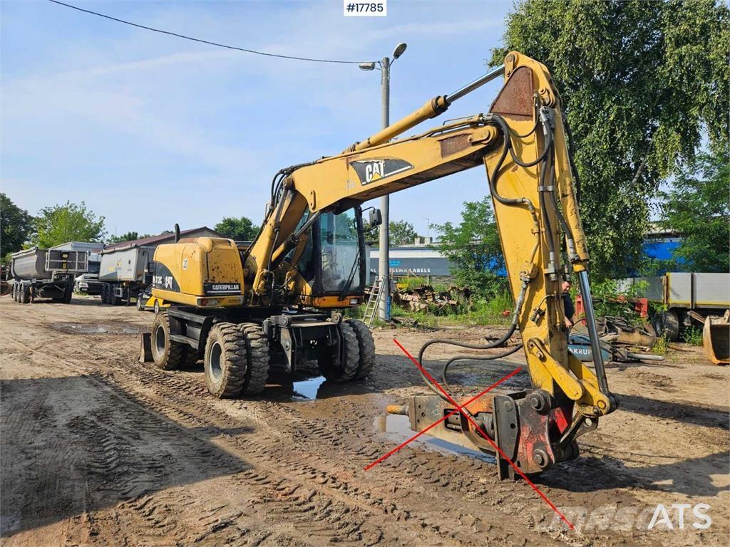 CAT M313 C Bageri točkaši