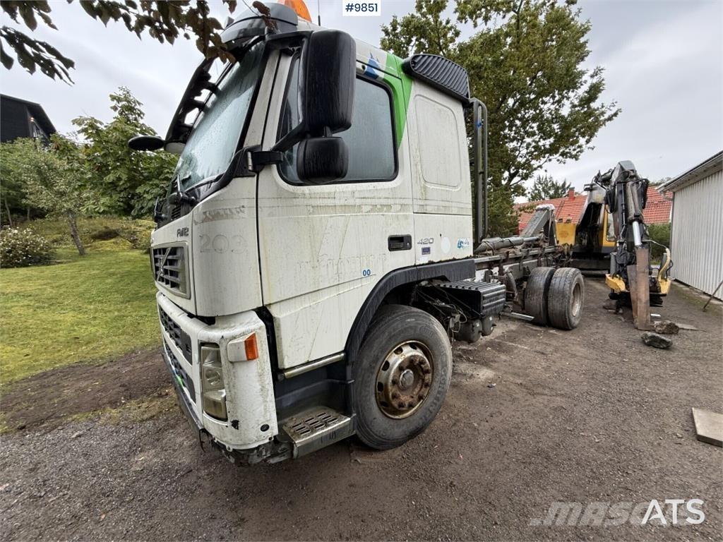 Volvo FM12 Rol kiper kamioni sa kukom za podizanje tereta