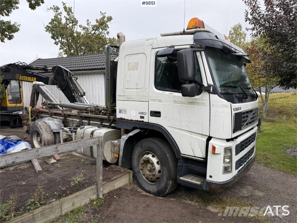Volvo FM12 Rol kiper kamioni sa kukom za podizanje tereta