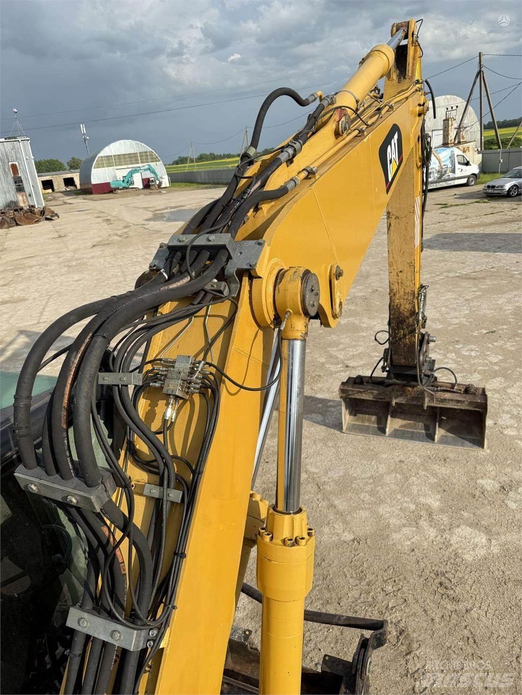 CAT M315C Bageri točkaši