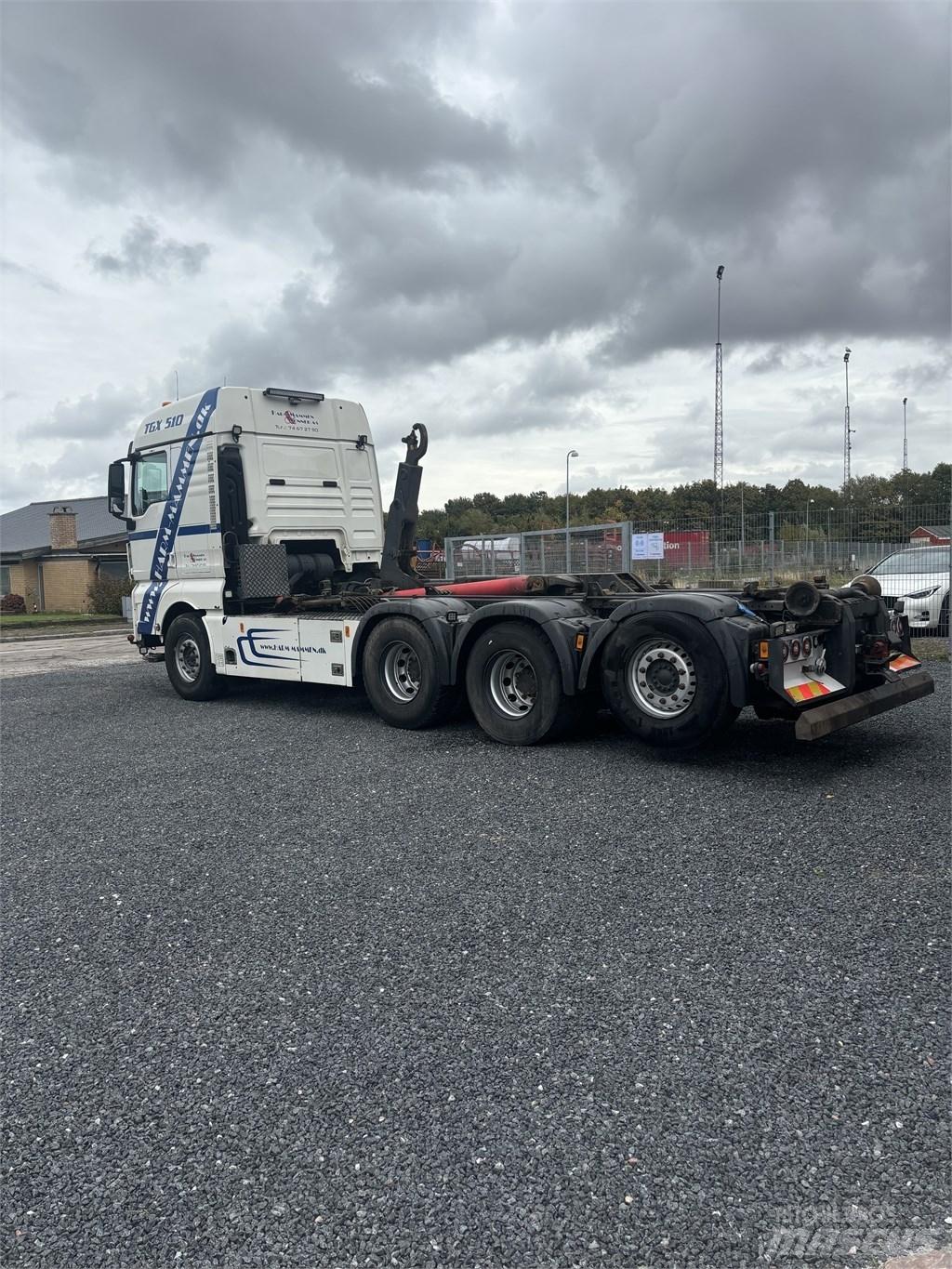 MAN TGX 35.510 Rol kiper kamioni sa kukom za podizanje tereta