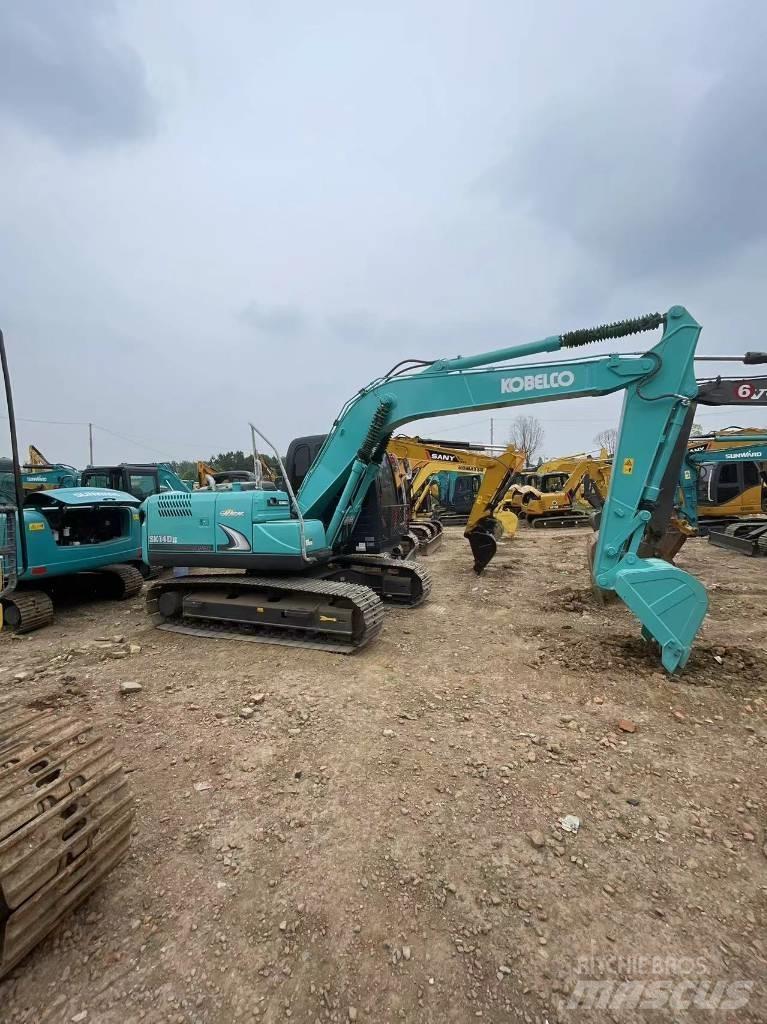Kobelco SK140 Bageri guseničari