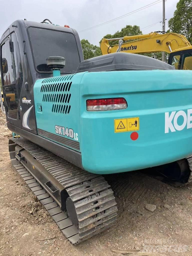Kobelco SK140 Bageri guseničari