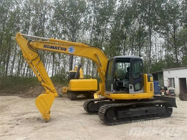 Komatsu PC128US Bageri guseničari