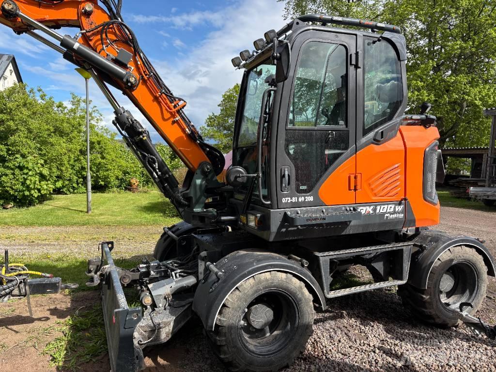 Develon DX 100 W-7 Bageri točkaši