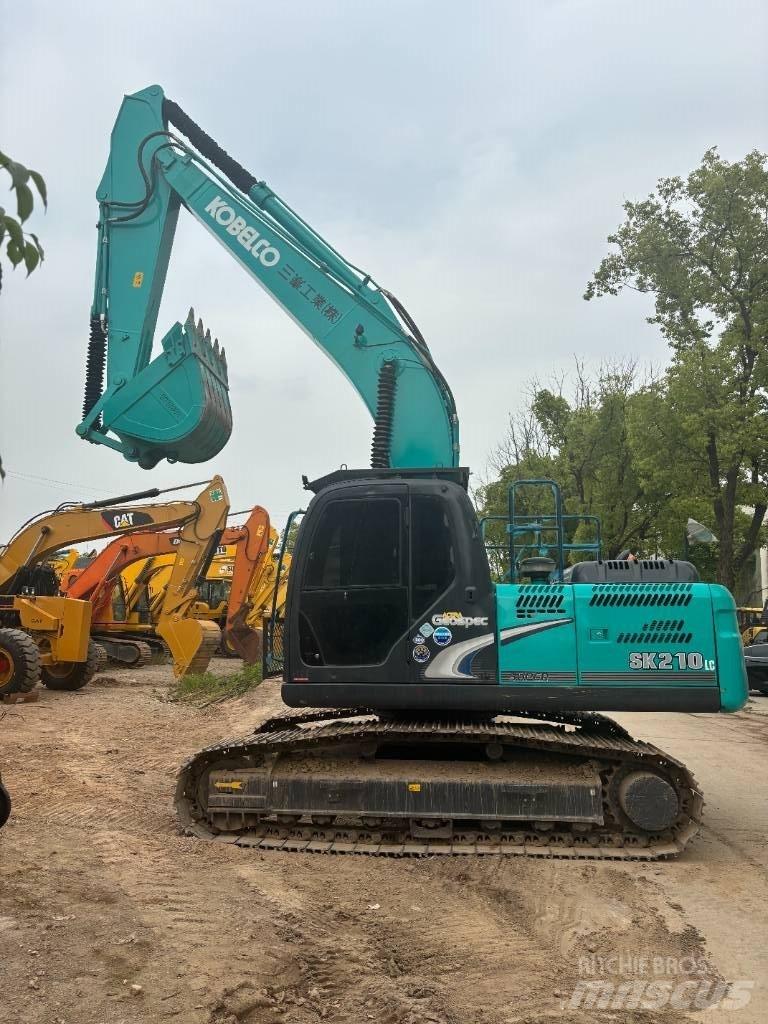 Kobelco SK 210 Bageri guseničari
