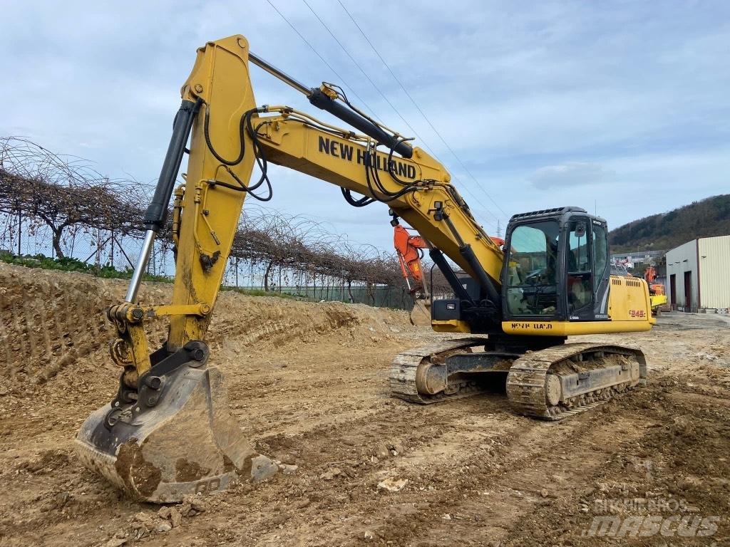 New Holland E245 Bageri guseničari