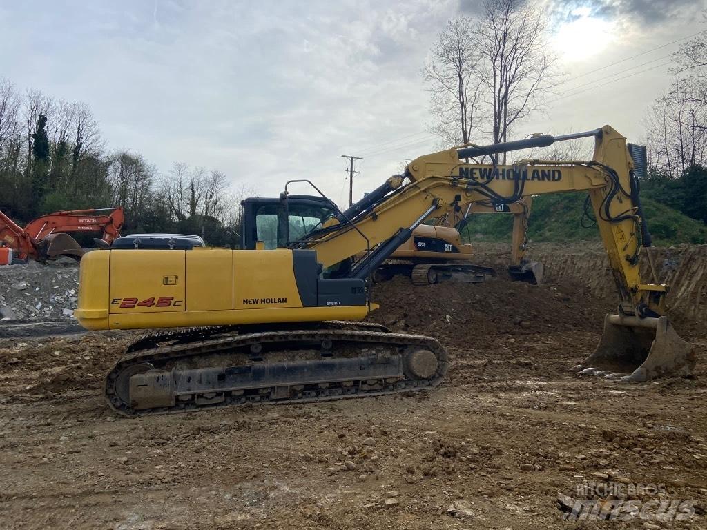 New Holland E245 Bageri guseničari
