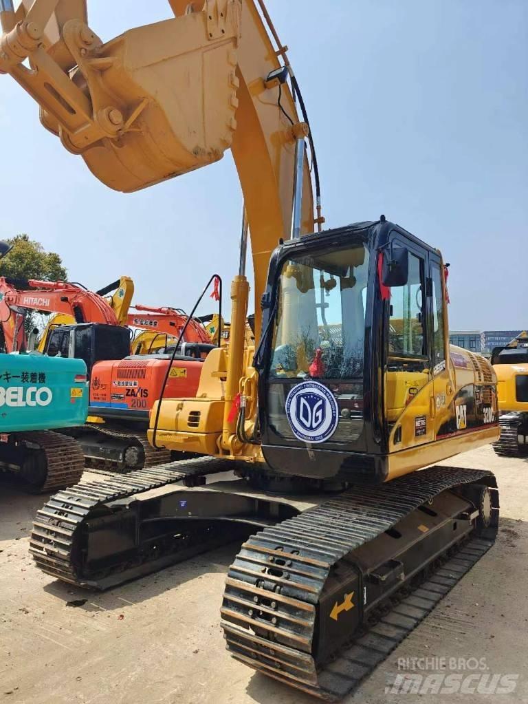 CAT CAT320C Midi bageri 7t – 12t