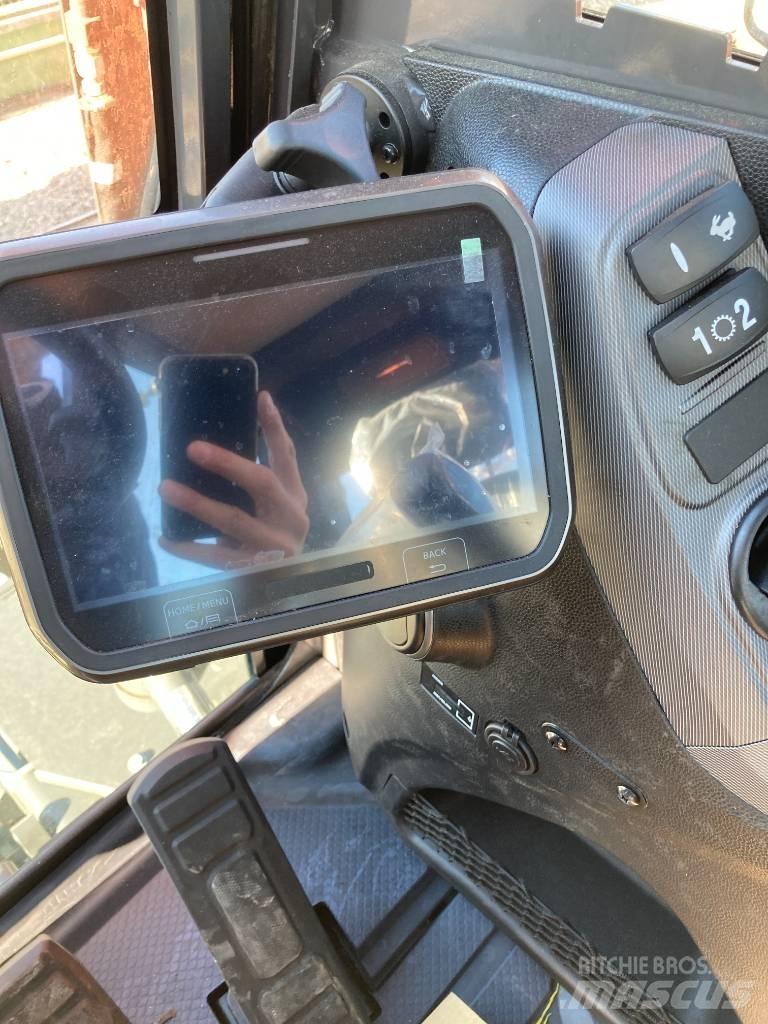 Develon DX 100 W-7 Bageri točkaši
