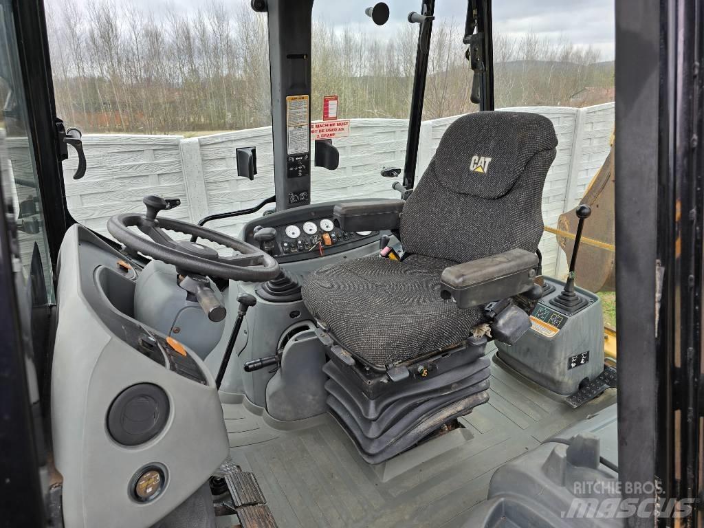 CAT 428 D Rovokopači