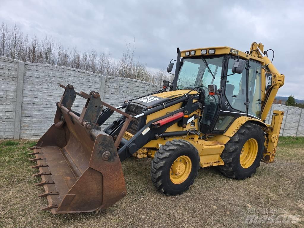CAT 428 D Rovokopači