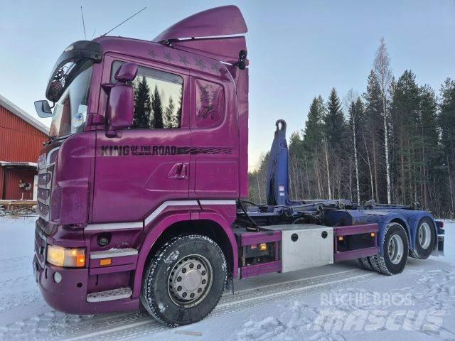 Scania R 560 Rol kiper kamioni sa kukom za podizanje tereta