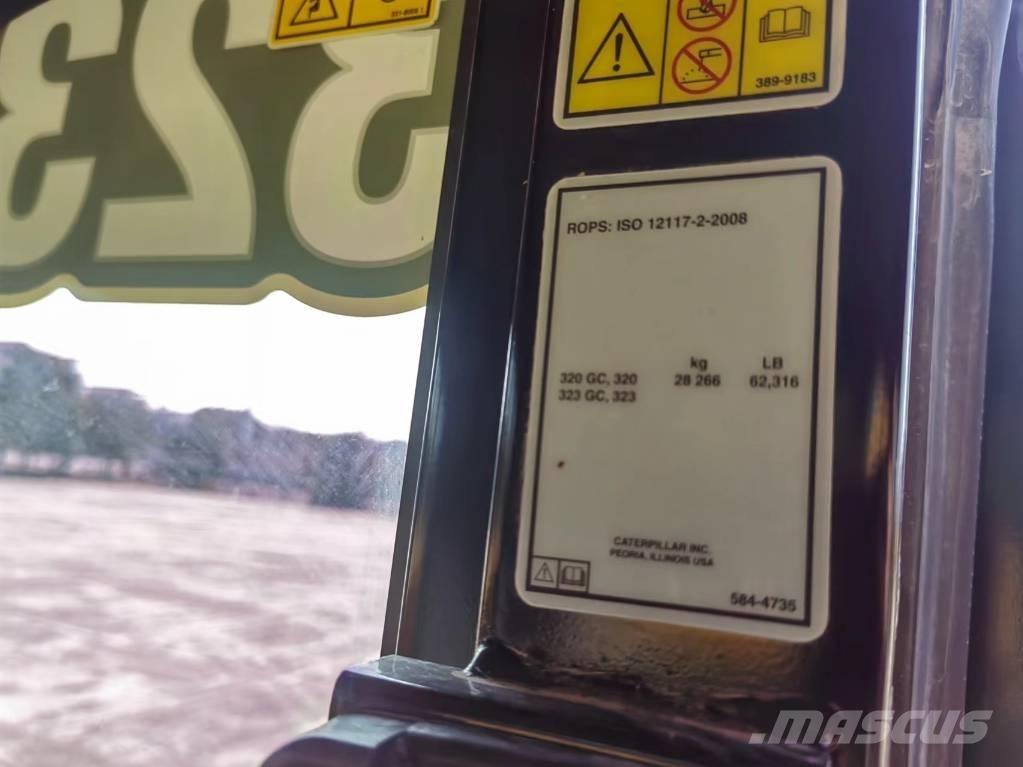 CAT 2022 CAT 323 Bageri točkaši