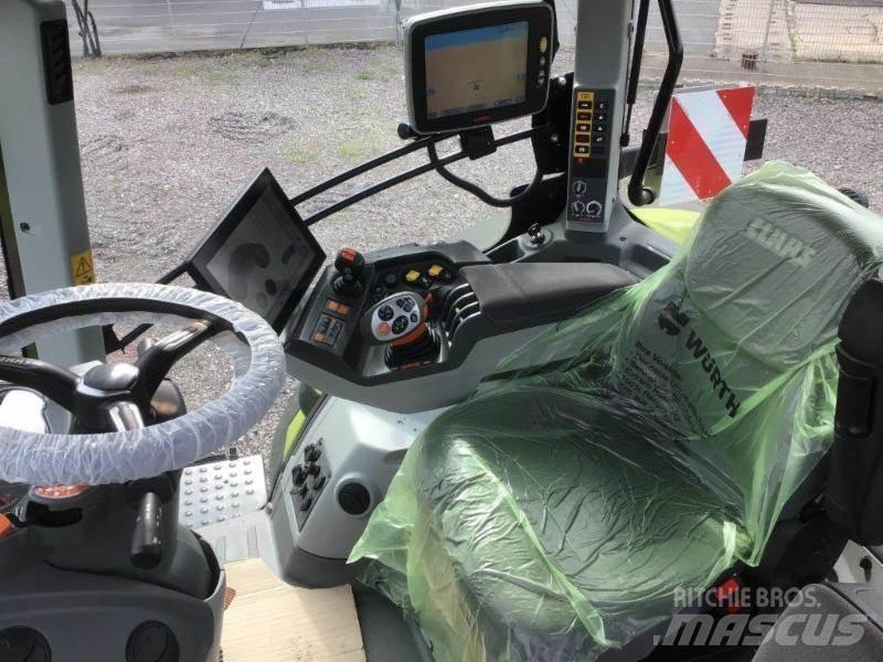 CLAAS AXION 810 Traktori