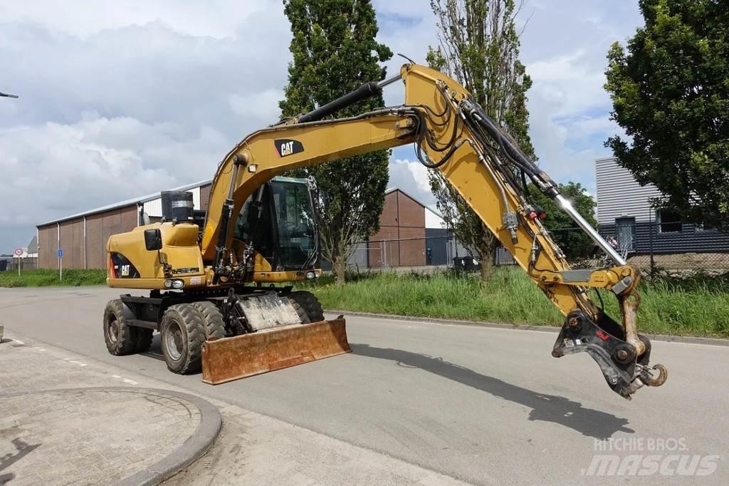 CAT M313 D Bageri točkaši