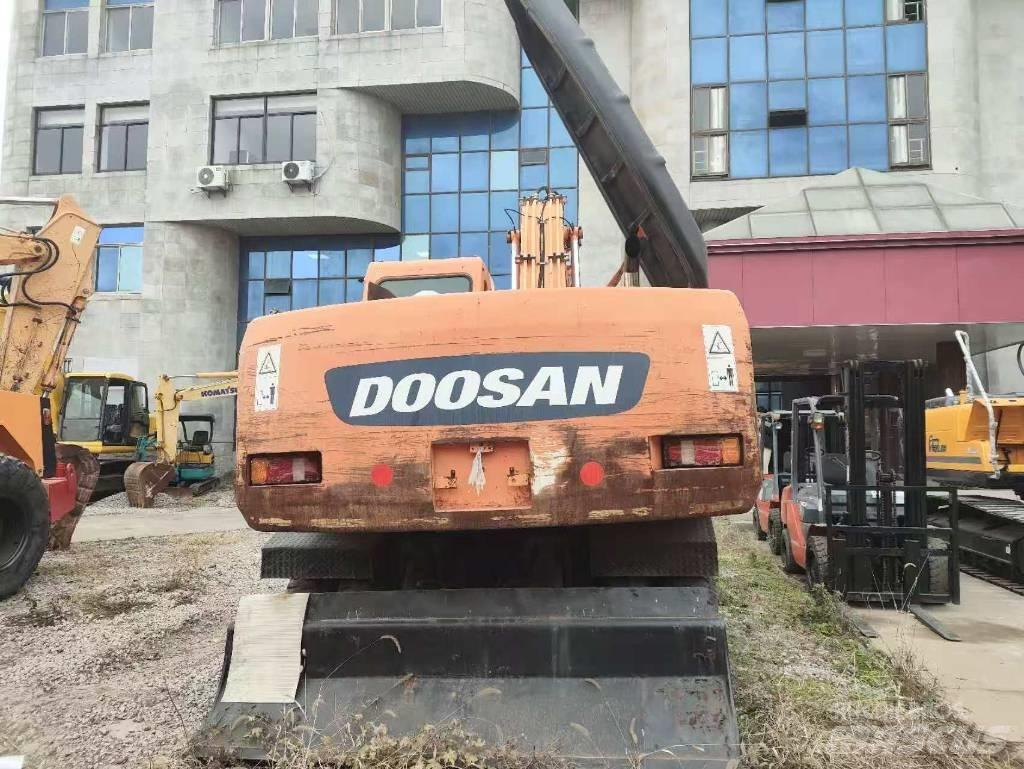Doosan DX 210 W Bageri točkaši