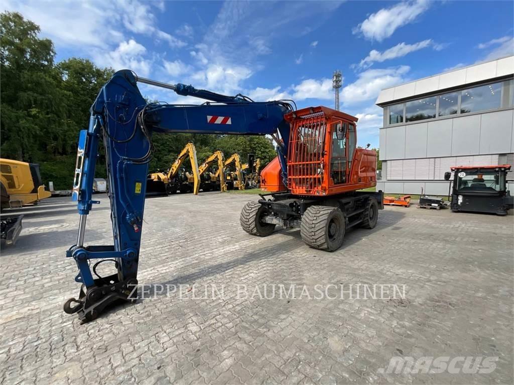 CAT M318-07A Bageri točkaši