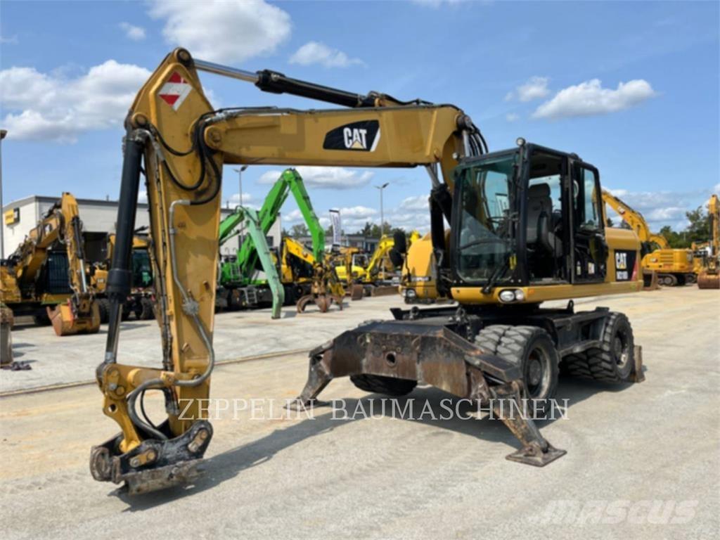 CAT M318D Bageri točkaši