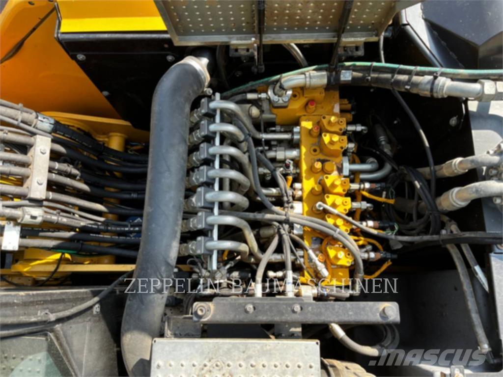 CAT M318F Bageri točkaši