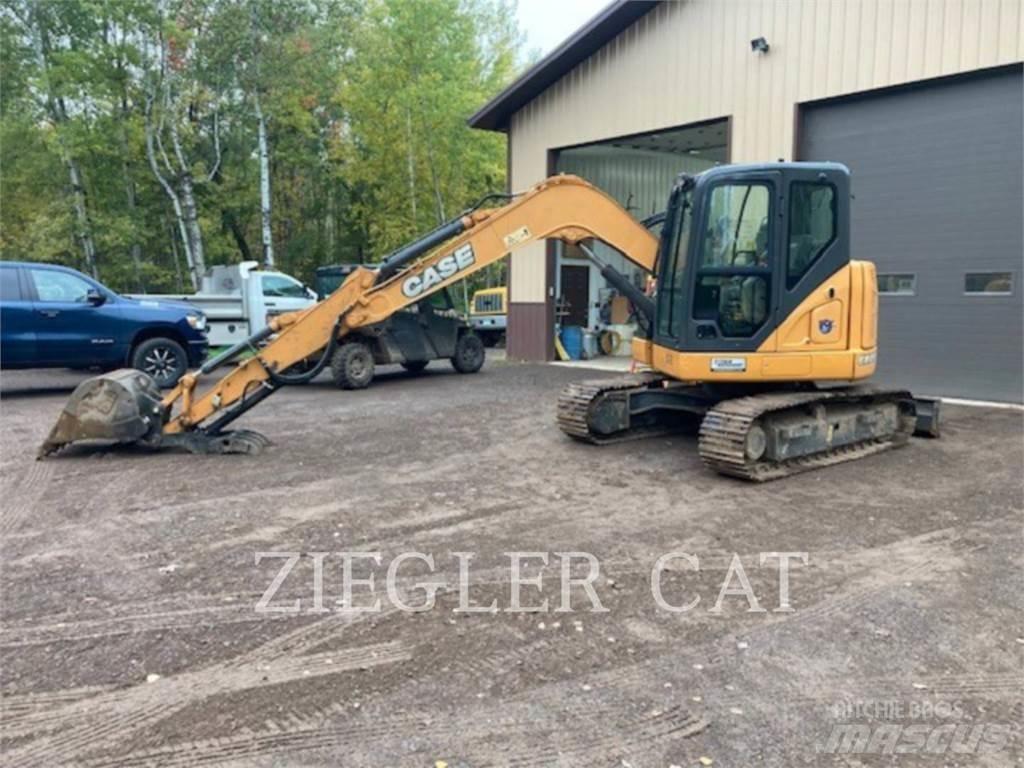 New Holland CX75-C Bageri guseničari