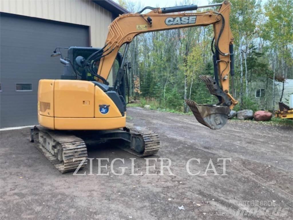 New Holland CX75-C Bageri guseničari