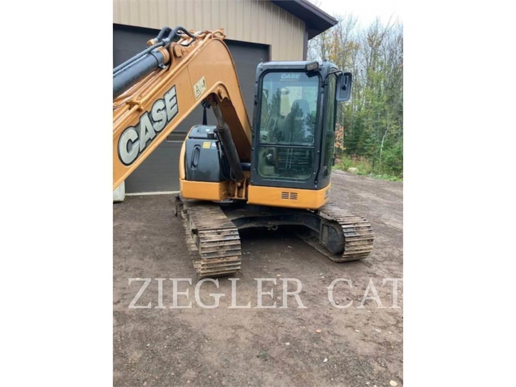 New Holland CX75-C Bageri guseničari