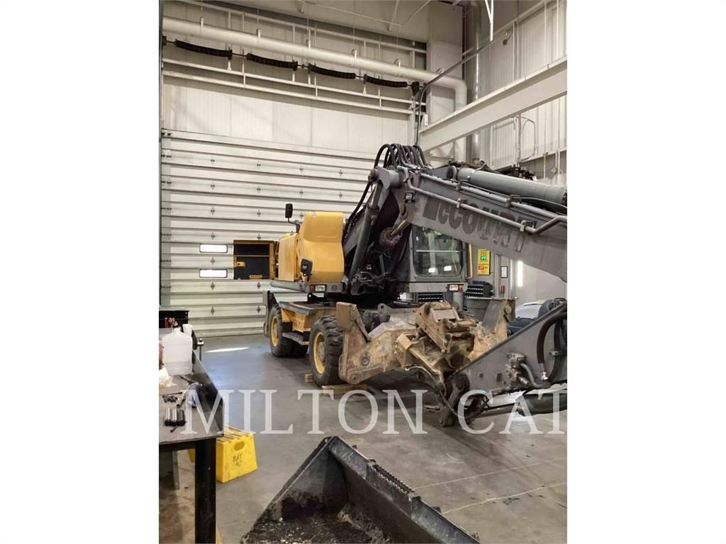 Volvo EW210C Bageri guseničari