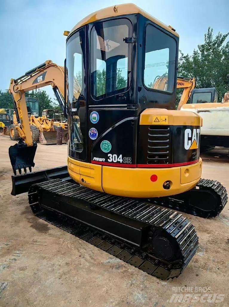 CAT 304 Mini bageri < 7t