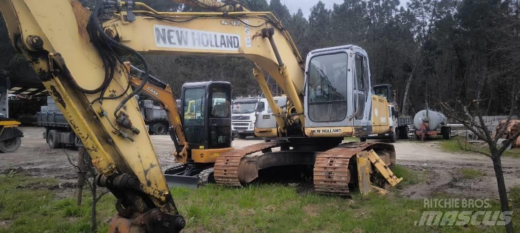 New Holland E 215 B Bageri guseničari