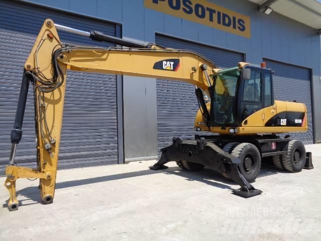 CAT M 318 D Bageri točkaši