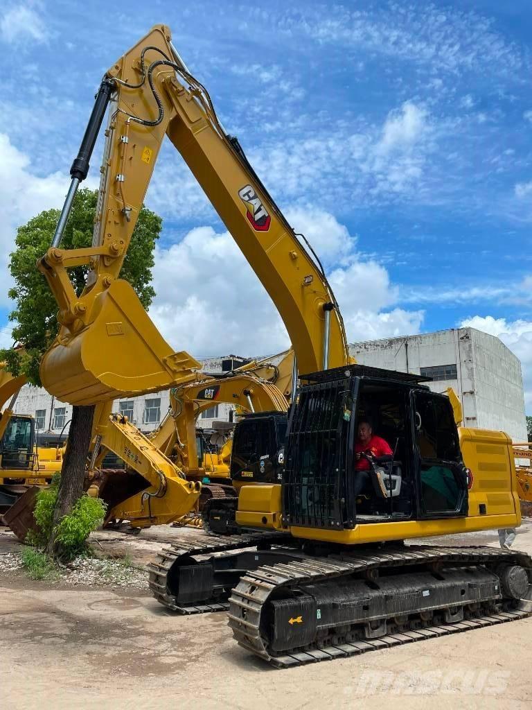 CAT 323 Midi bageri 7t – 12t