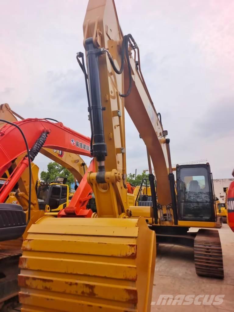 CAT 323 GC Bageri guseničari