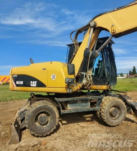 CAT M318 D Bageri točkaši