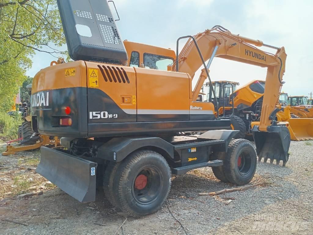 Hyundai 150W-9 Bageri guseničari