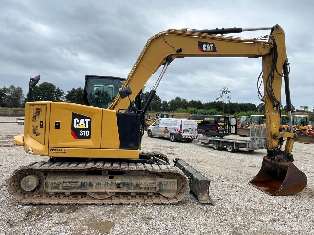 CAT 310 Midi bageri 7t – 12t