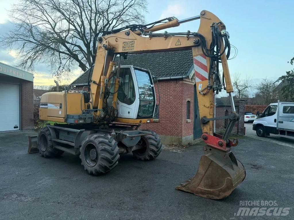 Liebherr A312 Bageri točkaši