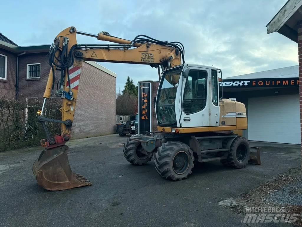 Liebherr A312 Bageri točkaši