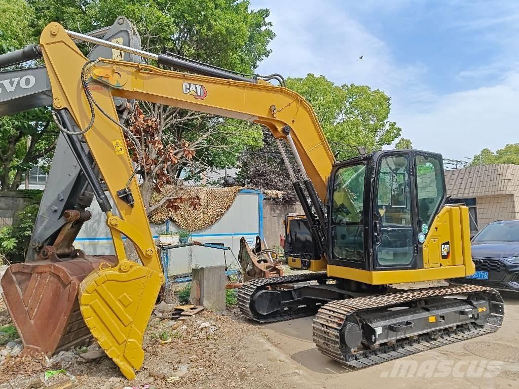CAT 310 Bageri guseničari