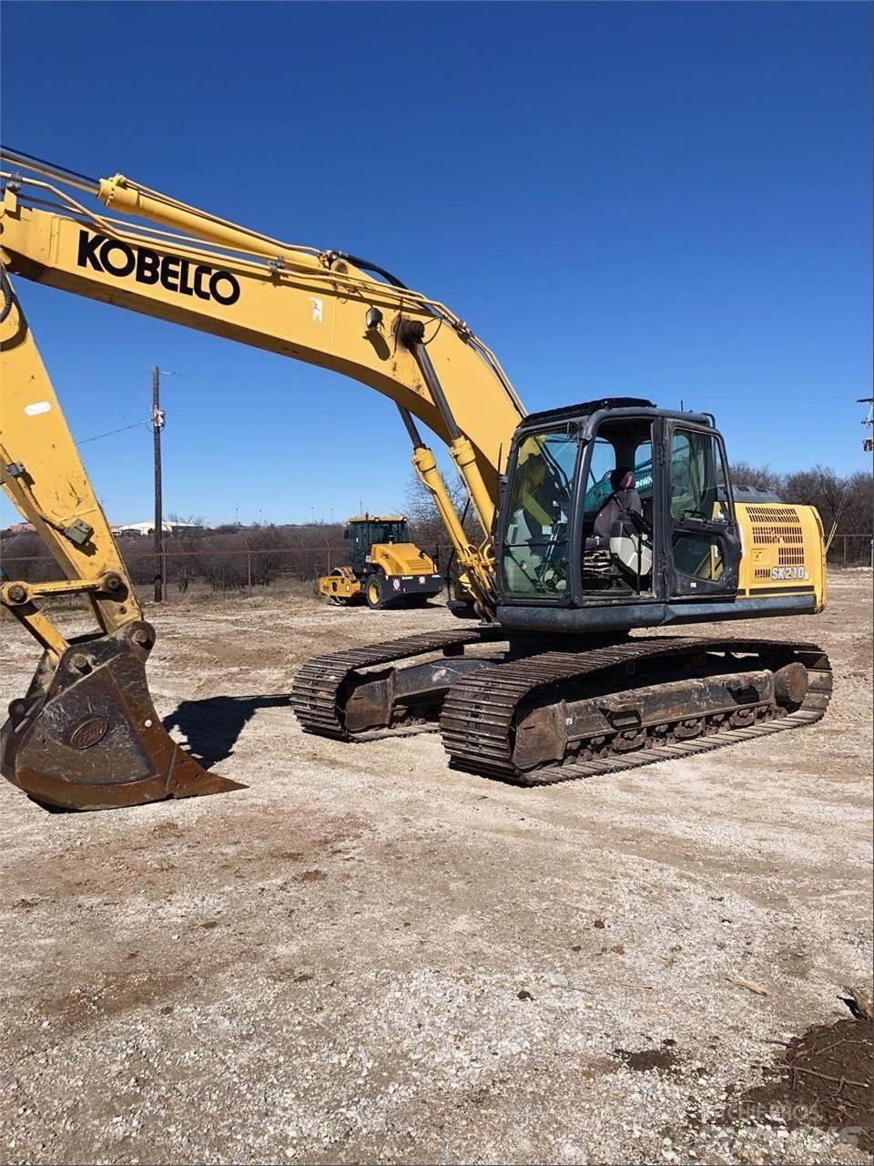Kobelco SK210 LC-9 Bageri guseničari
