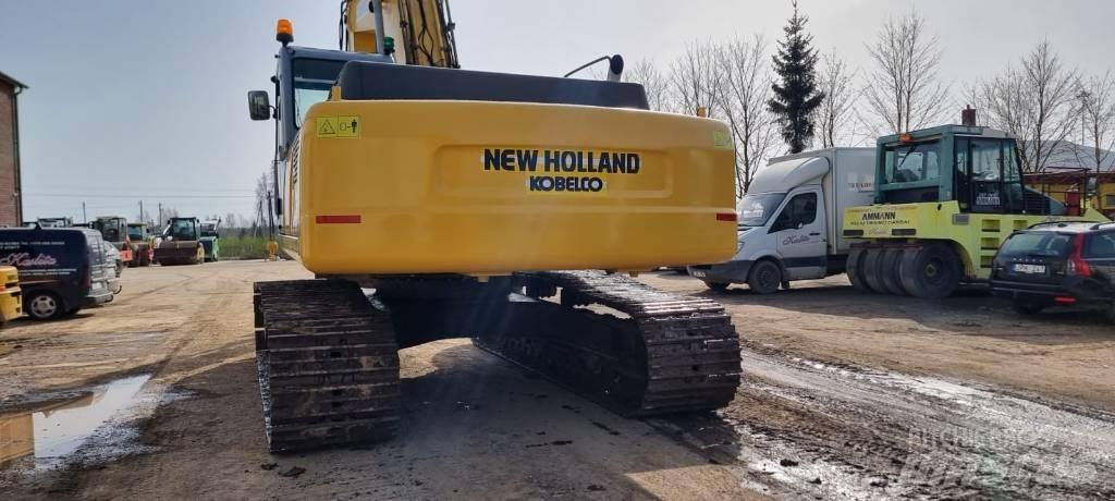 New Holland E 385 Bageri guseničari