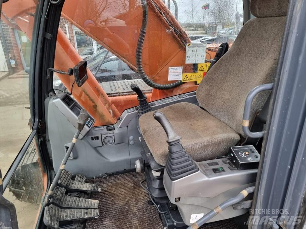 Doosan DX 225 LC Bageri guseničari